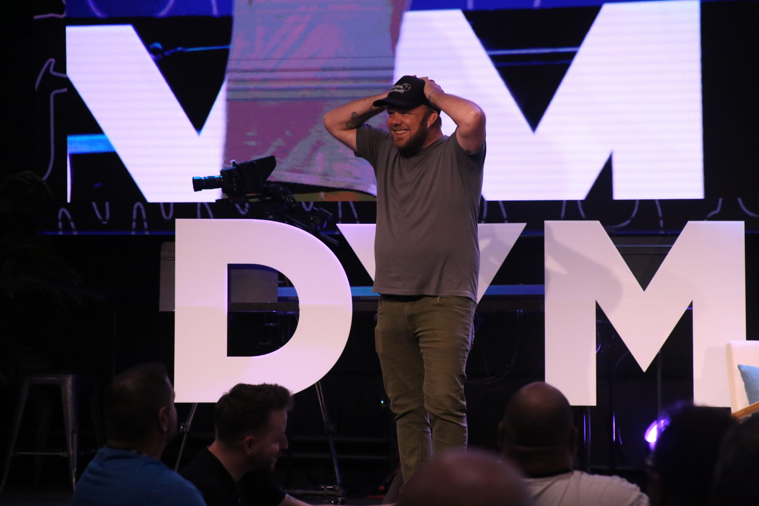 David Wood performing magic on stage