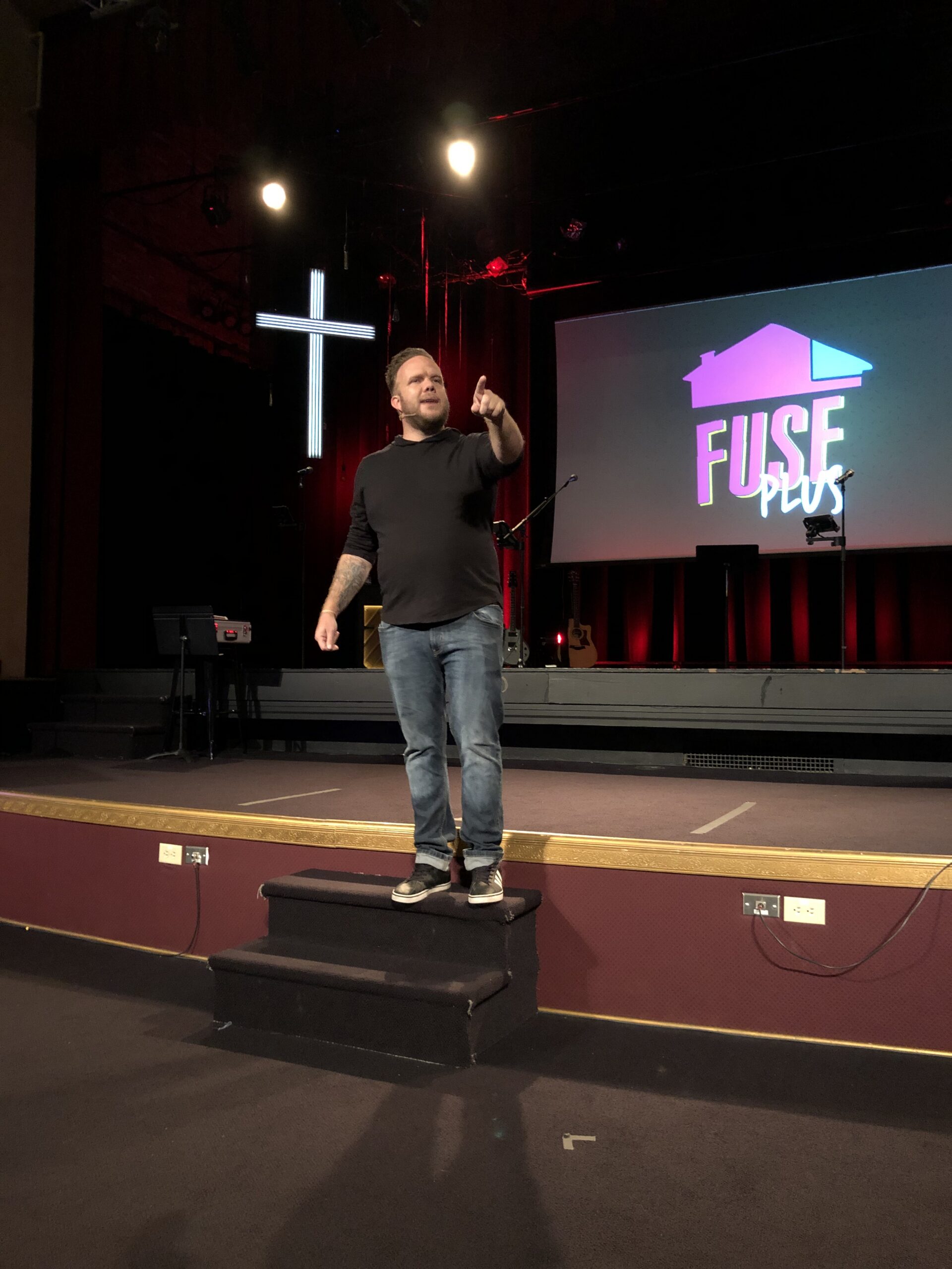 David Wood speaking on stage