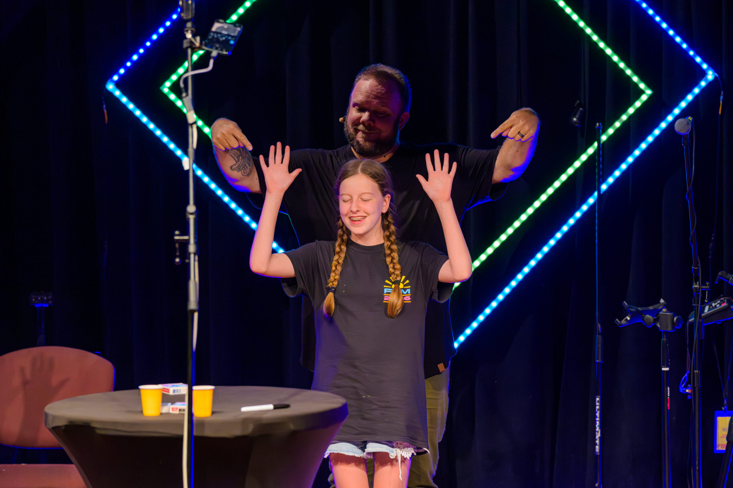 David Wood performing at a camp